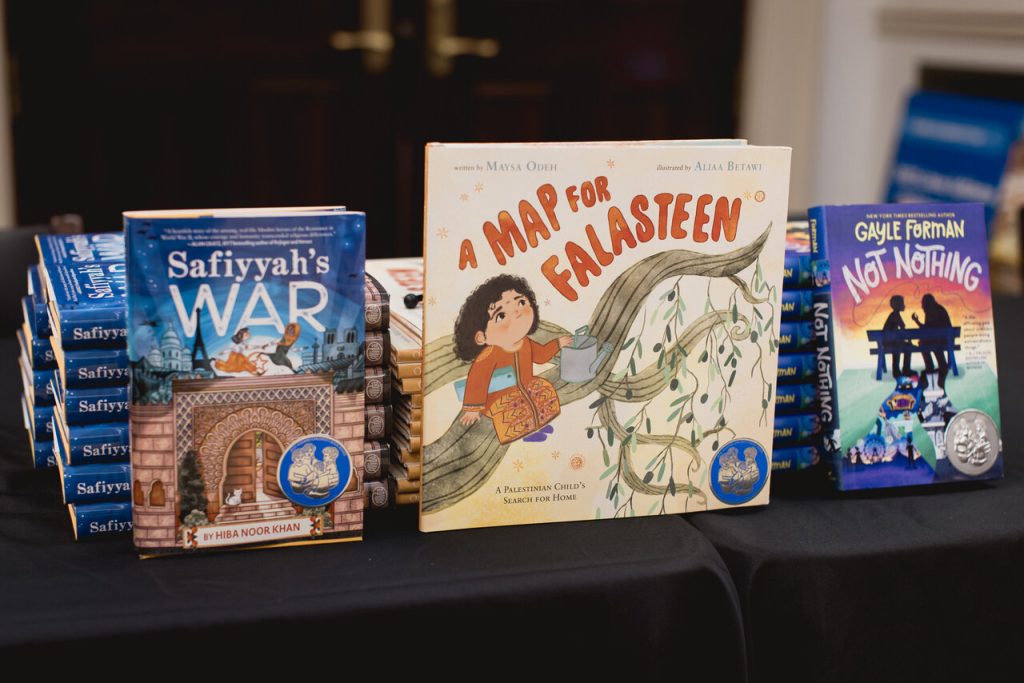 three books with book seals